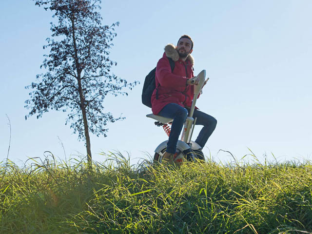  two wheel saddle-equipped scooter